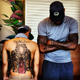 Illustration for article titled LeBron Poses For Photo With Fan Who Has Ridiculous LeBron Tattoo